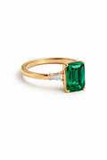 The "Verdant Majesty" Emerald Cut Three-Stone Ring