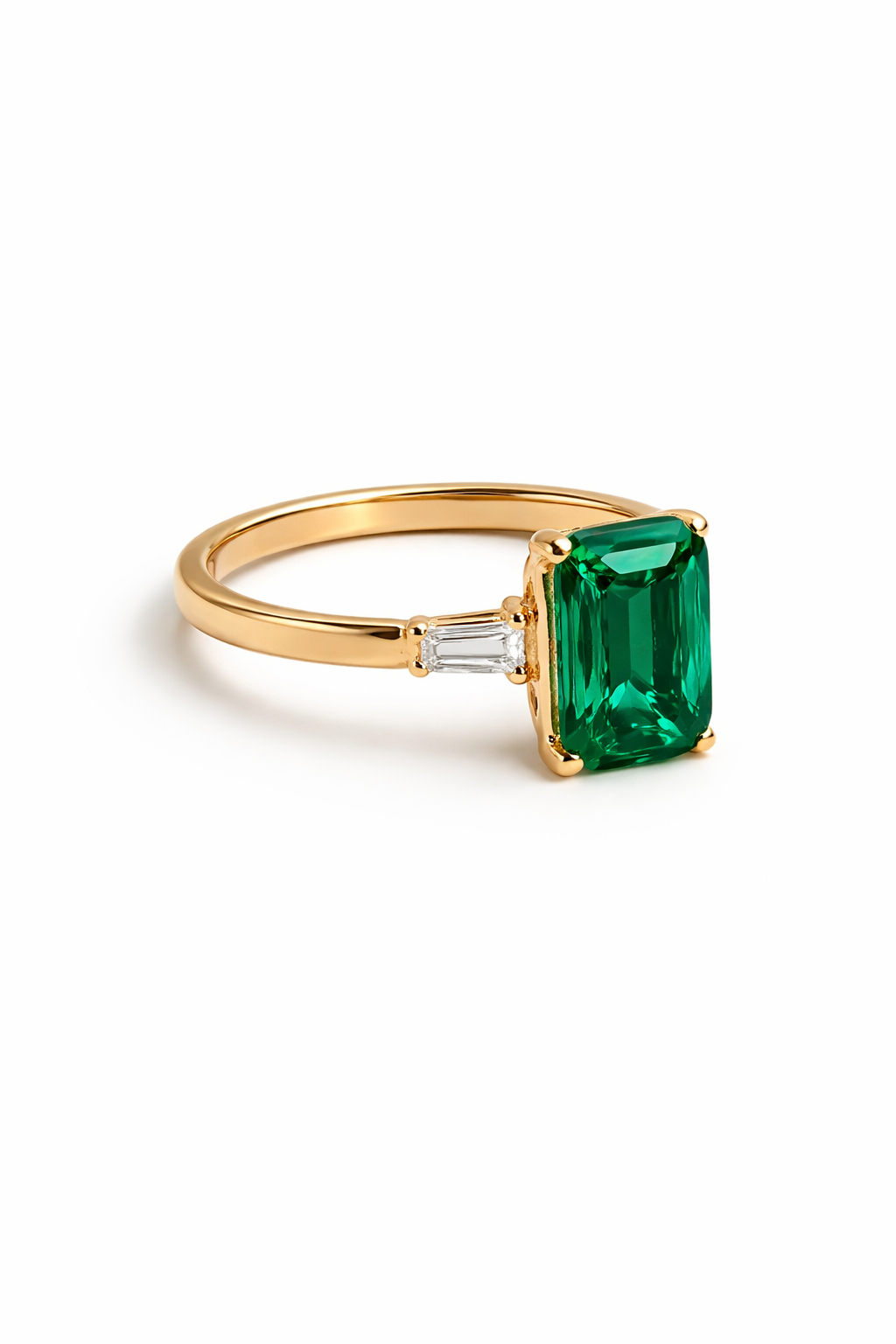 The "Verdant Majesty" Emerald Cut Three-Stone Ring